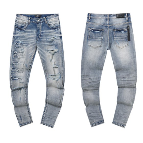 Light Blue Washed Denim Jeans with Textured Distressing